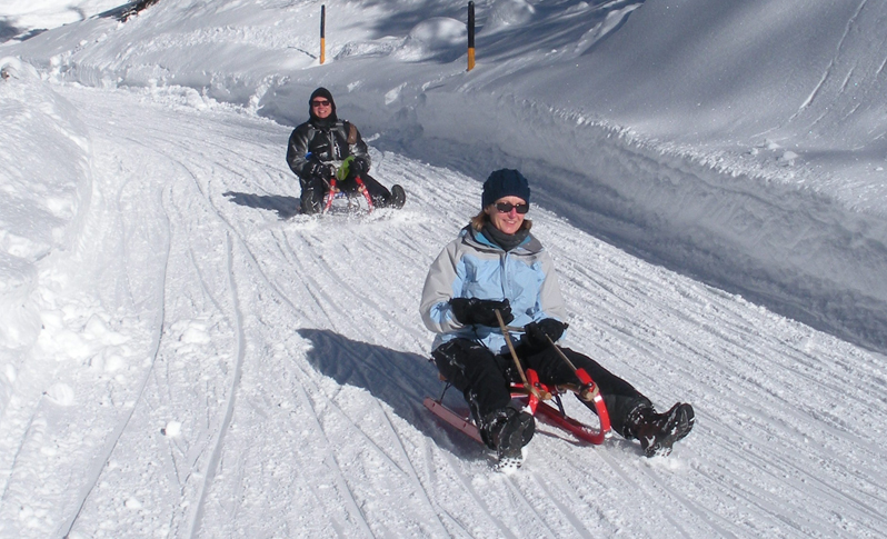 John & Nancy sledging in the Swiss Alps